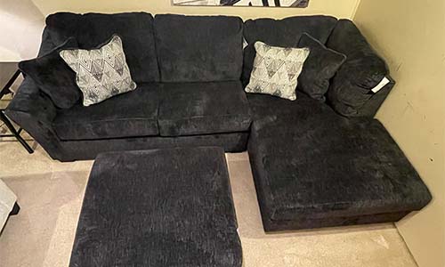A nice living room display, showing off a couch set